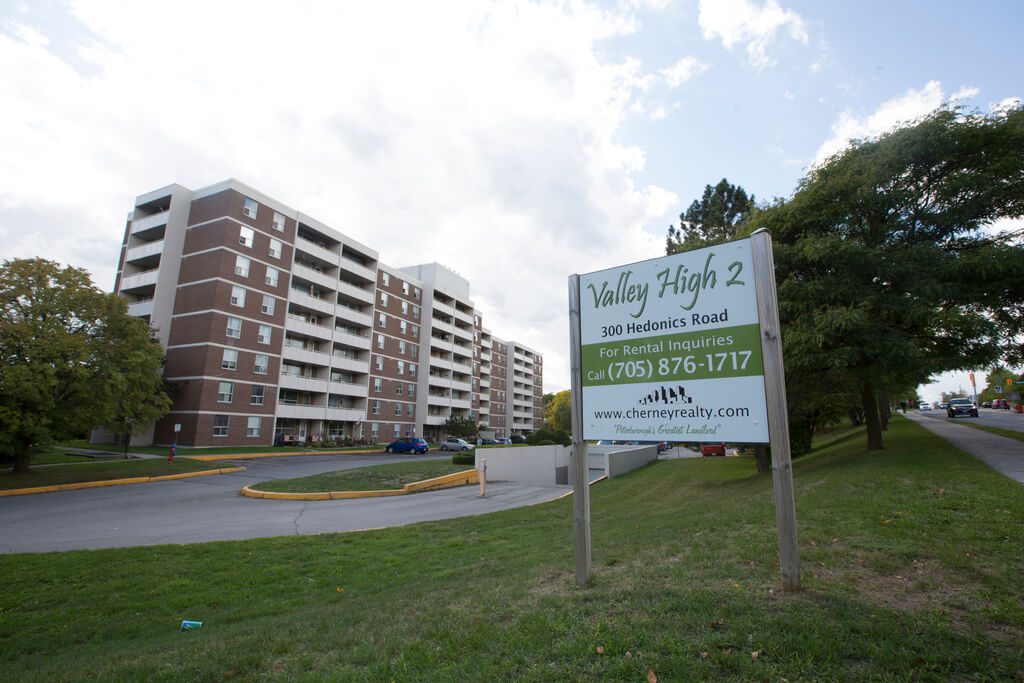 Valley High Apartments and Sign